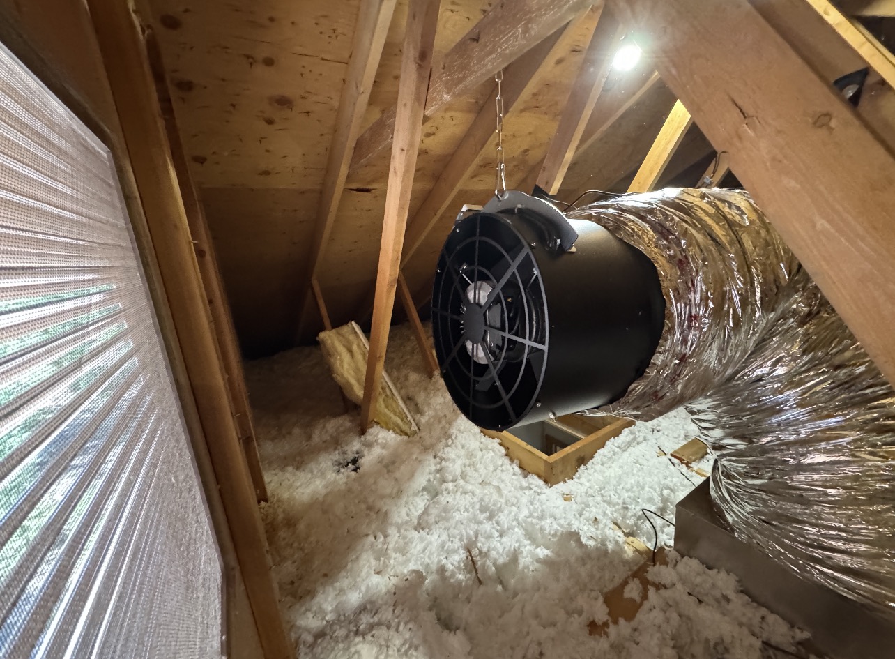 Whole house fan assembly installed in the attic, venting through attic vents, in a home in Evergreen, CO 80439